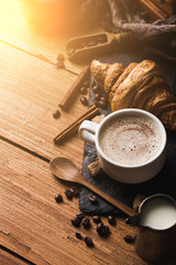 Black coffee with milk flatlay view on wooden background