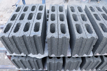 Stacking of concrete blocks laying on the ground