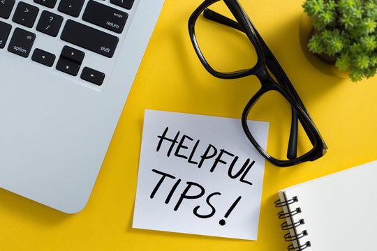 Helpful Tips Concept On Top View Office Desktop