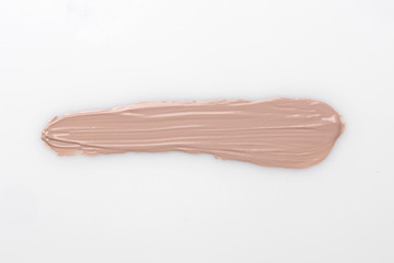 the texture of a foundation liquid a white background