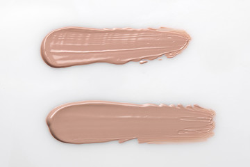 the texture of a foundation liquid a white background