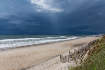Fototapeta na wymiar Dark skies over a North Carolina beach