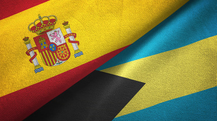 Spain and Bahamas two flags textile cloth, fabric texture
