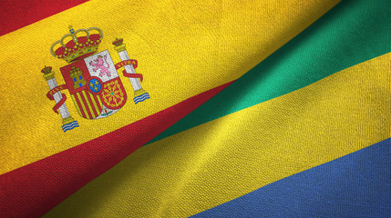 Spain and Gabon two flags textile cloth, fabric texture