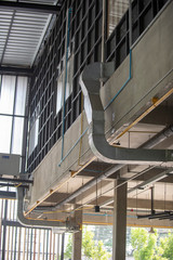 Fototapeta premium The BBQ restaurant ventilation system with airflow fan, air duct and pipe for ventilate vacuum odor and smoke from the kitchen and BBQ tables to outdoor area.