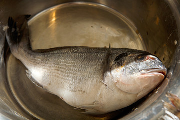 top view closeup peeled by knife fresh dorado fish