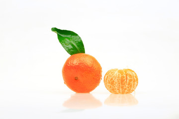 Fresh oranges on a white background