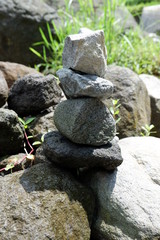 Fototapeta na wymiar the art of stone balance on the river