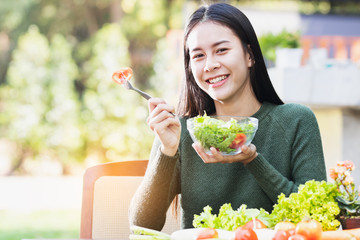  beautiful Asia woman,teen,girl eating useful food with happy.