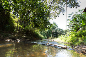 Swings along the stream of waterfalls in Thailand