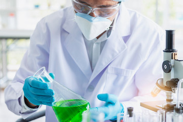 Fototapeta premium Scientists are doing research in science laboratories and microscopes are working devices.