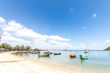 Fototapeta na wymiar White sand beach in sunny day, The beautiful sea at Ranong Province, Thailand