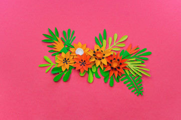 Decorative Arrangement of tropical leaves and flowers. Handmade workshop.