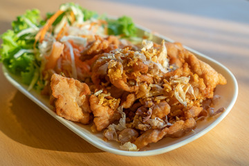 Close up deep fried pork with garlic