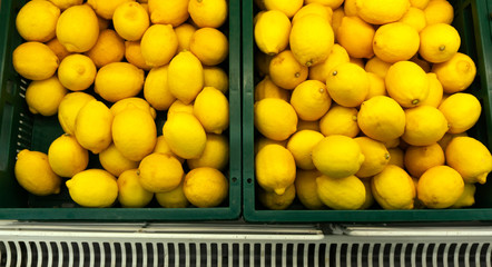 Lemon raw many in market background and department store. displayed is sale.