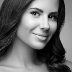 Fototapeta premium monochrome closeup portrait of beautiful young brunette woman