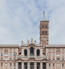 Fototapeta na wymiar Front facade and tower of Basilica of Santa Maria Maggiore in Rome, Italy