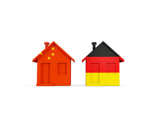 Two houses with flags of China and germany