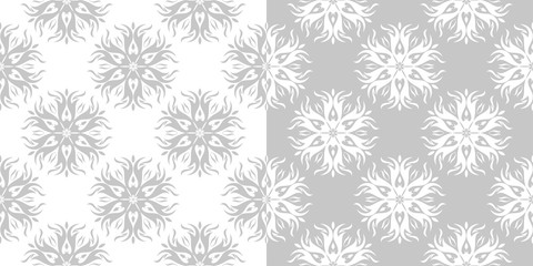 Compilation of gray and white floral patterns. Set of seamless backgrounds
