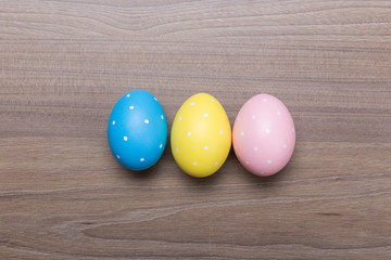 Easter eggs on wooden background