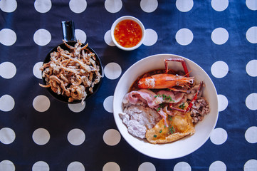 Thai seafood noodle with pork, bacon, prawn and fried mushroom