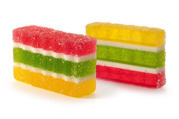 Marmalade candy with multi-colored layers on a white background