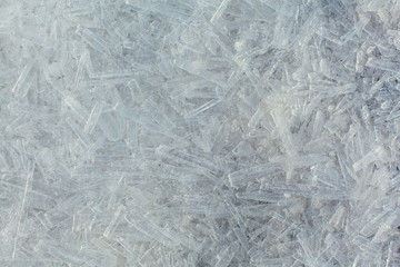 Amazing abstract broken ice crystals texture. Clear melting ice background.
