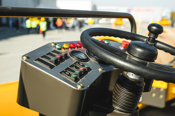 Industrial Vehicle. Heavy Construction Equipment Machine.  asphalt roller, view inside the cabin interior controls