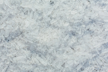 Amazing abstract broken ice crystals texture. Clear melting ice background.