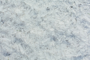 Amazing abstract broken ice crystals texture. Clear melting ice background.