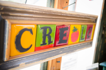 A block letter sign saying creole in New Orleans