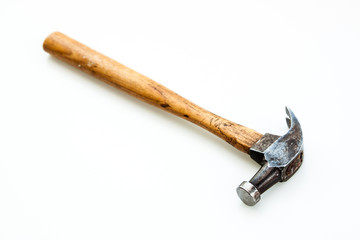 Vintage and old hammer iron head and wood handle put on white background