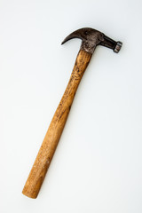 Vintage and old hammer iron head and wood handle put on white background