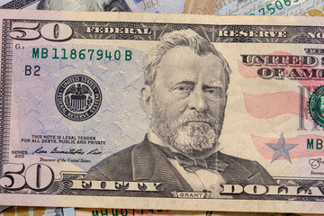 Close up of a fifty dollar bill. Background of dollar bills. American Dollars Cash Money. fifty Bucks. Ulysses Grant portrait