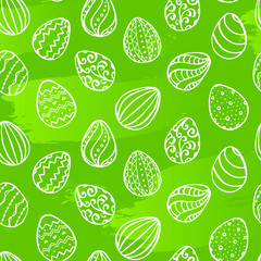 Easter seamless pattern with hand drawn eggs on green background. Doodling style. Vector 10 EPS illustration