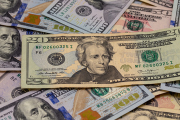 Background of dollar bills. American Dollars Cash Money. One hundred dollars, fifty dollars, ten...