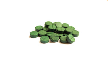 Supplement, spirulina tablets top view.