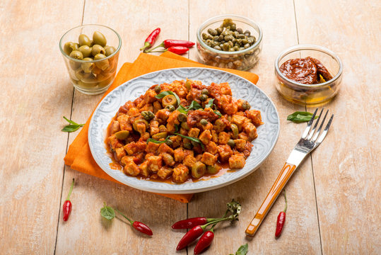 tempeh with tomatoes capers and green olives