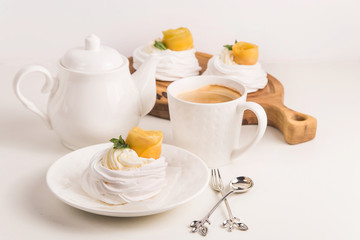 Light festive pavlova dessert made from meringue, lemon kurt and whipped cream