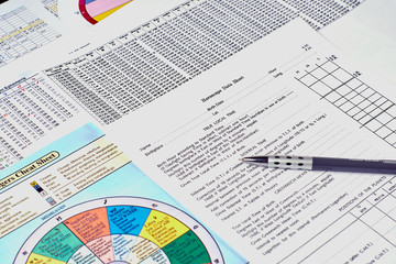 Astrological forecast. Horoscope data sheet and pencil on the background of Astrological ephemeris...