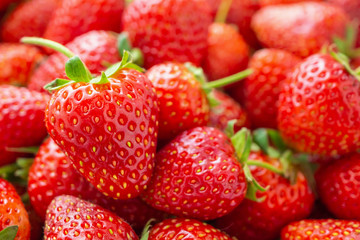 Fresh organic red ripe Strawberry fruit background closeup