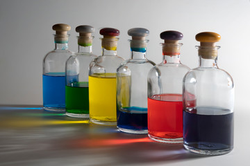 Bottles with colored liquid