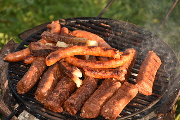 barbecue  in Romania,, spicy sausages and bacon