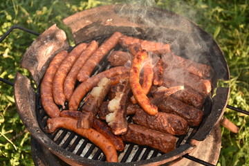  barbecue in Romania,, spicy sausages and bacon