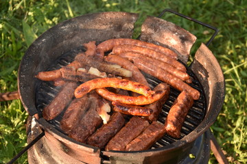  barbecue in Romania,, spicy sausages and bacon