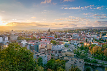 Cluj city overview at sunrise from Cetatuia Hill in Cluj-Napoca, Romania