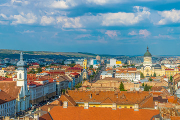 Obraz premium Unitarian Church and the Dormition of the Theotokos Cathedral viewed from St. Michael's Church in Cluj-Napoca, Romania