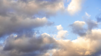 Fototapeta na wymiar dramatic clouds against the blue sky