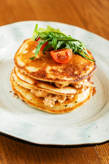 potato pancakes with chicken and salad