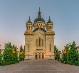 The Dormition of the Theotokos Cathedral at sunset, the most famous Romanian Orthodox church of Cluj-Napoca, Romania. Built in a Romanian Brancovenesc style